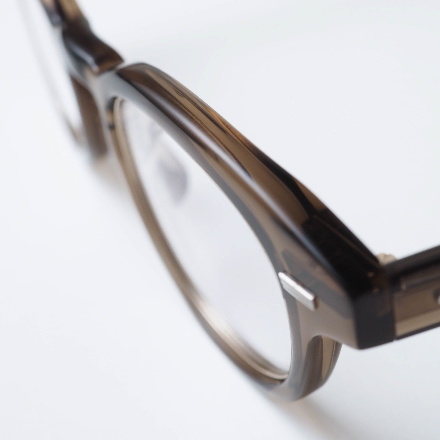 U-128RS IND col.03(Brown / White gold)